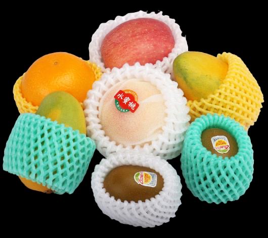 Fruit in pastel foam netting sleeves, mint, yellow and white mesh against orange and pink, a whole palette pulled from produce packaging.