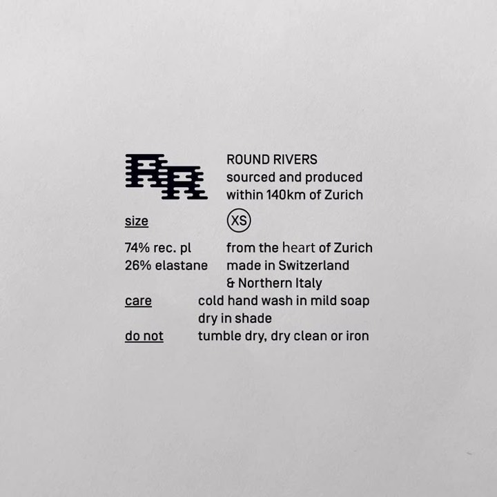 Garment care label as brand voice, tight grotesque left-aligned in labelled rows with a woven glyph mark, Swiss minimal.
